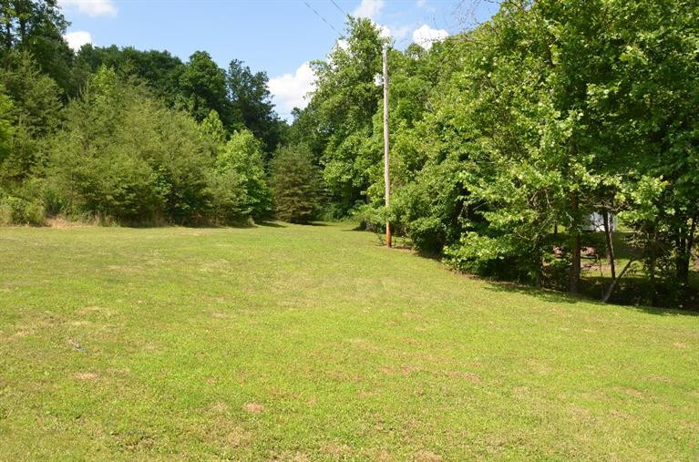 540 Clark Road Irvine, KY 40336 - Photo 17 of 24 This open pasture is backed by the woods