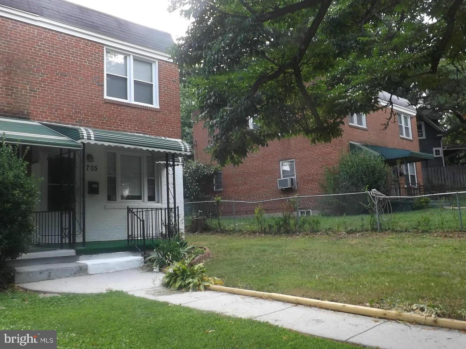 705 St Dunstans Road Baltimore, MD 21212 - Photo 1 of 21 a front view of a house with a yard