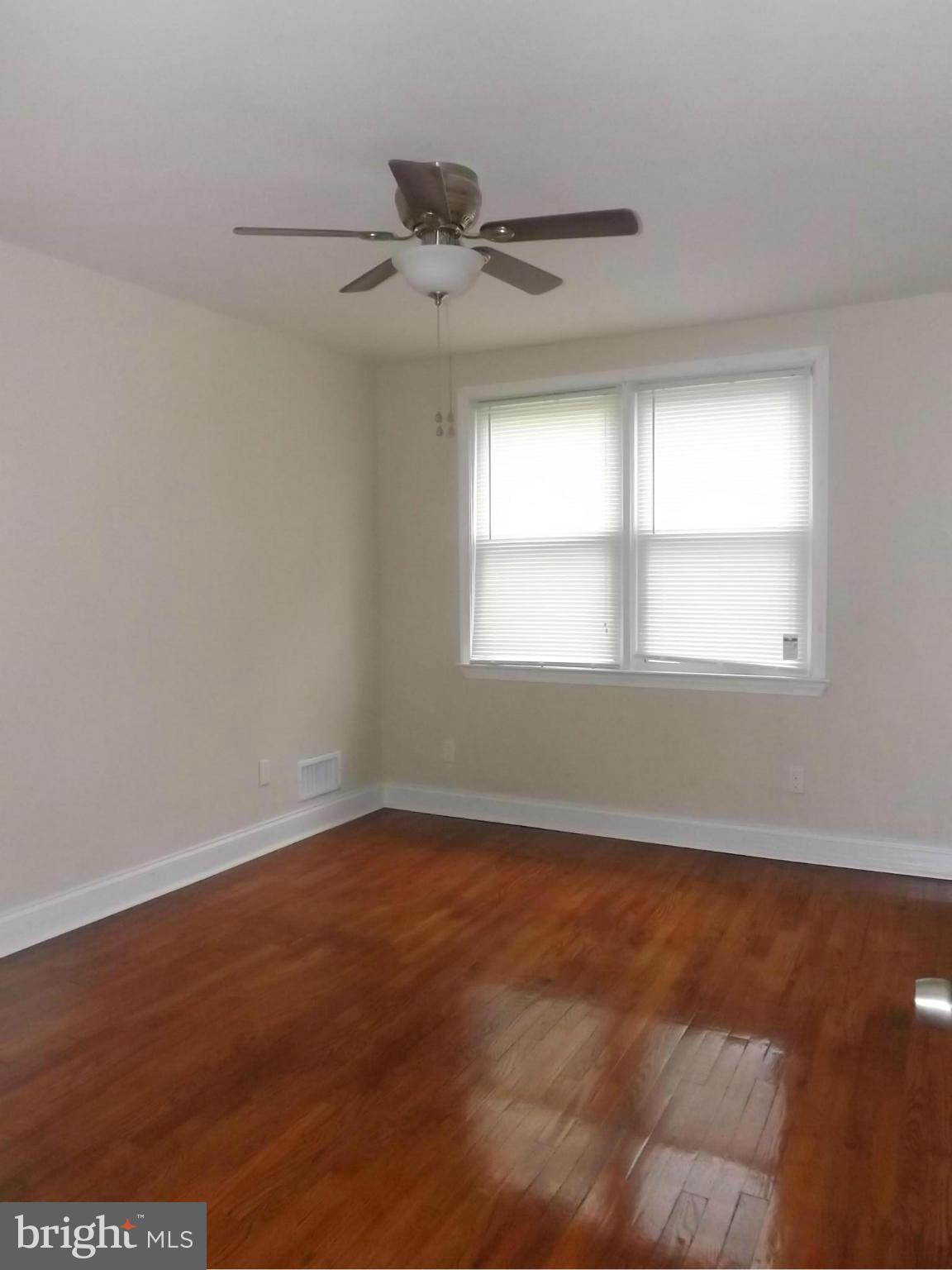 705 St Dunstans Road Baltimore, MD 21212 - Photo 14 of 21 a view of an empty room with a window