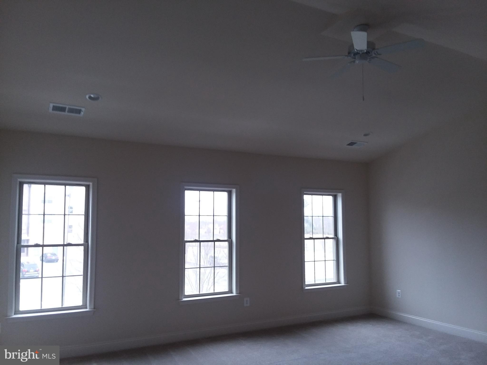22595 Windsor Locks Square Ashburn, VA 20148 - Photo 21 of 56 an empty room with windows