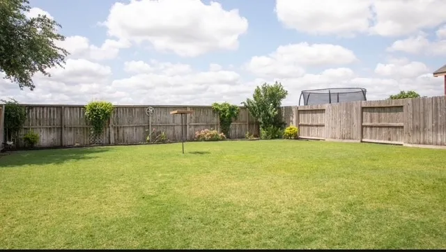 a view of a house with a swimming pool