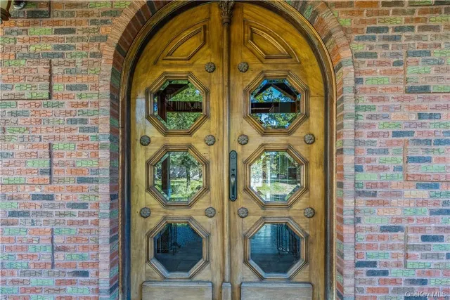 a view of a utility room with windows