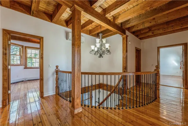 a view of entryway with wooden floor