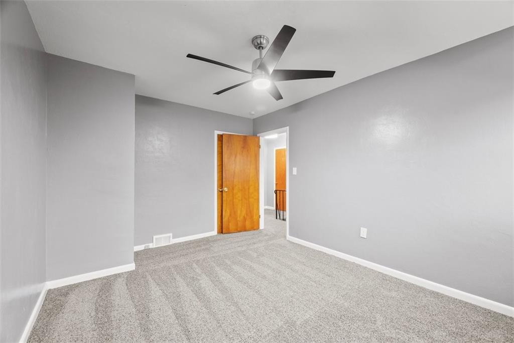 76 Montclair Avenue Pittsburgh, PA 15229 - Photo 20 of 34 a view of an empty room with a ceiling fan
