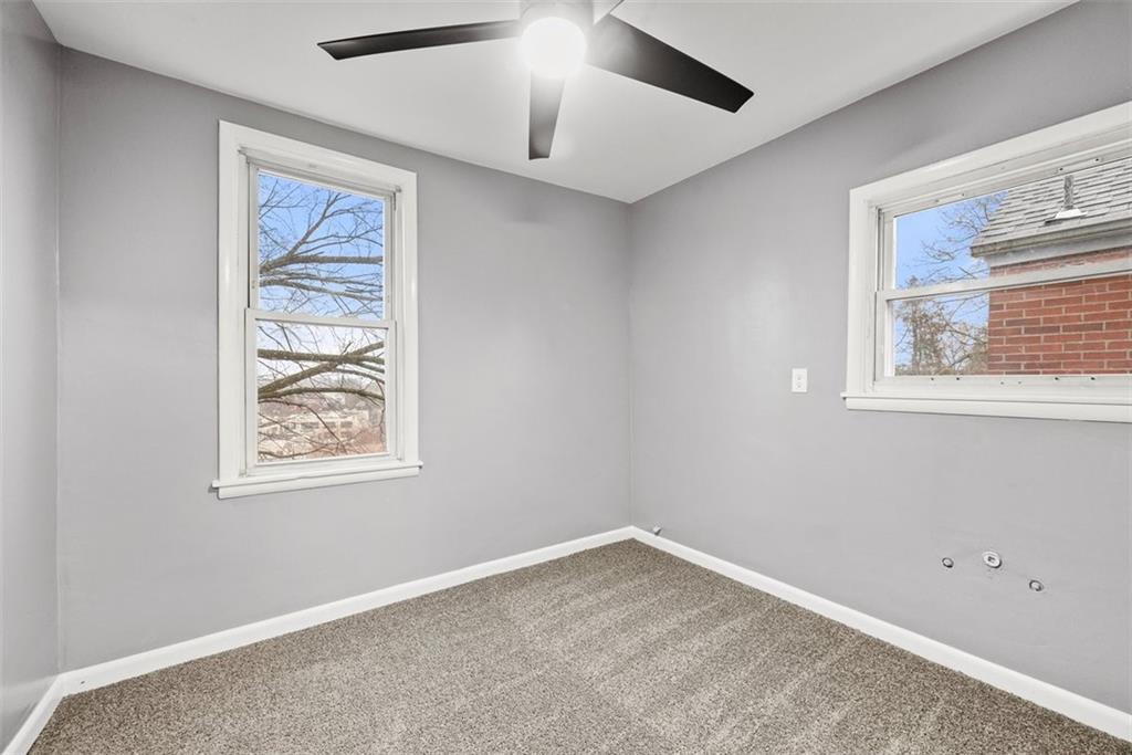 76 Montclair Avenue Pittsburgh, PA 15229 - Photo 25 of 34 an empty room with a window