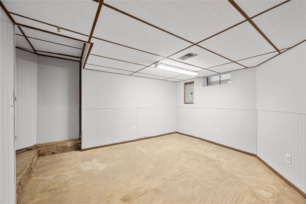 76 Montclair Avenue Pittsburgh, PA 15229 - Photo 26 of 34 a view of a room with racks on the wall