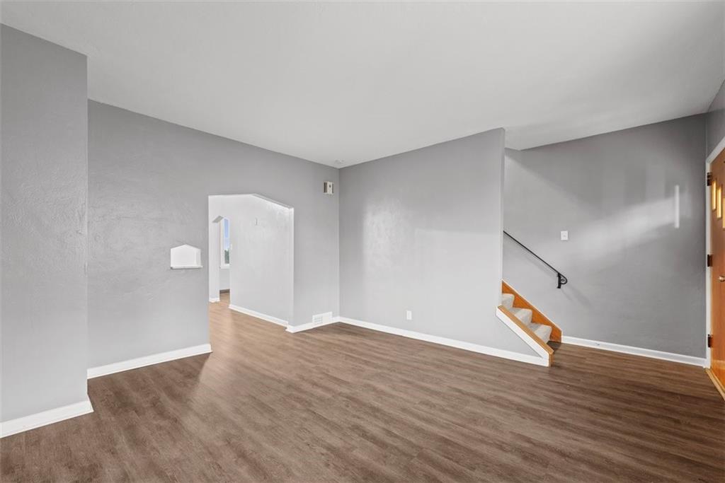 76 Montclair Avenue Pittsburgh, PA 15229 - Photo 3 of 34 a view of an empty room with wooden floor