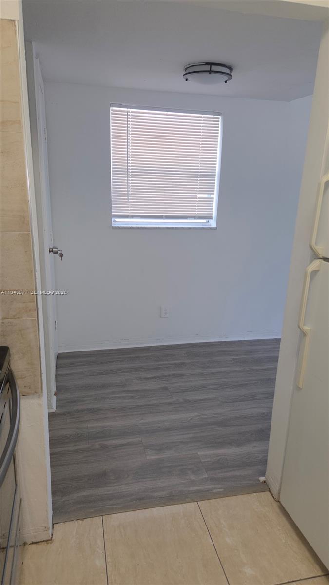 502-504 Phippen Waiters Road, Unit 3 Dania Beach, FL 33004 - Photo 19 of 22 a view of walk in closet