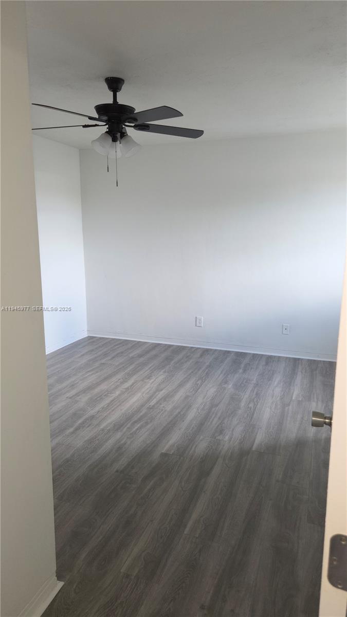 502-504 Phippen Waiters Road, Unit 3 Dania Beach, FL 33004 - Photo 4 of 22 a view of a room with wooden floor