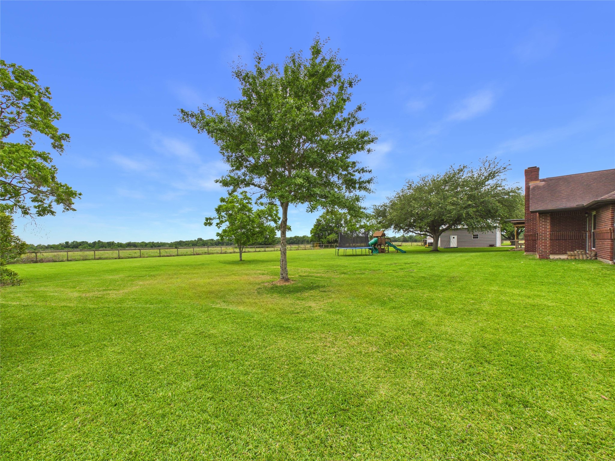 4610 Mustang Road Alvin, TX 77511 - Photo 49 of 50 Another view of the side and back yard. Fence line is inside the property line by approximately 5 feet.