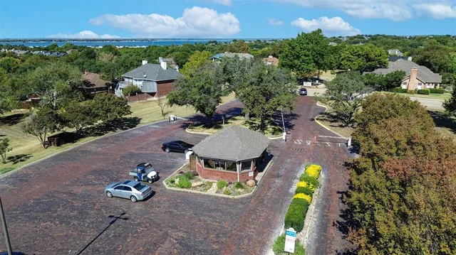 an aerial view of a house with a garden