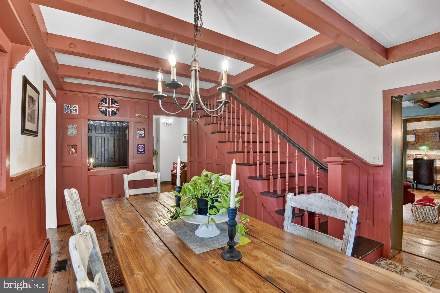2338 Jim Kohler Road Eldersburg, MD 21784 - Photo 22 of 63 a view of a porch with chairs and a potted plant