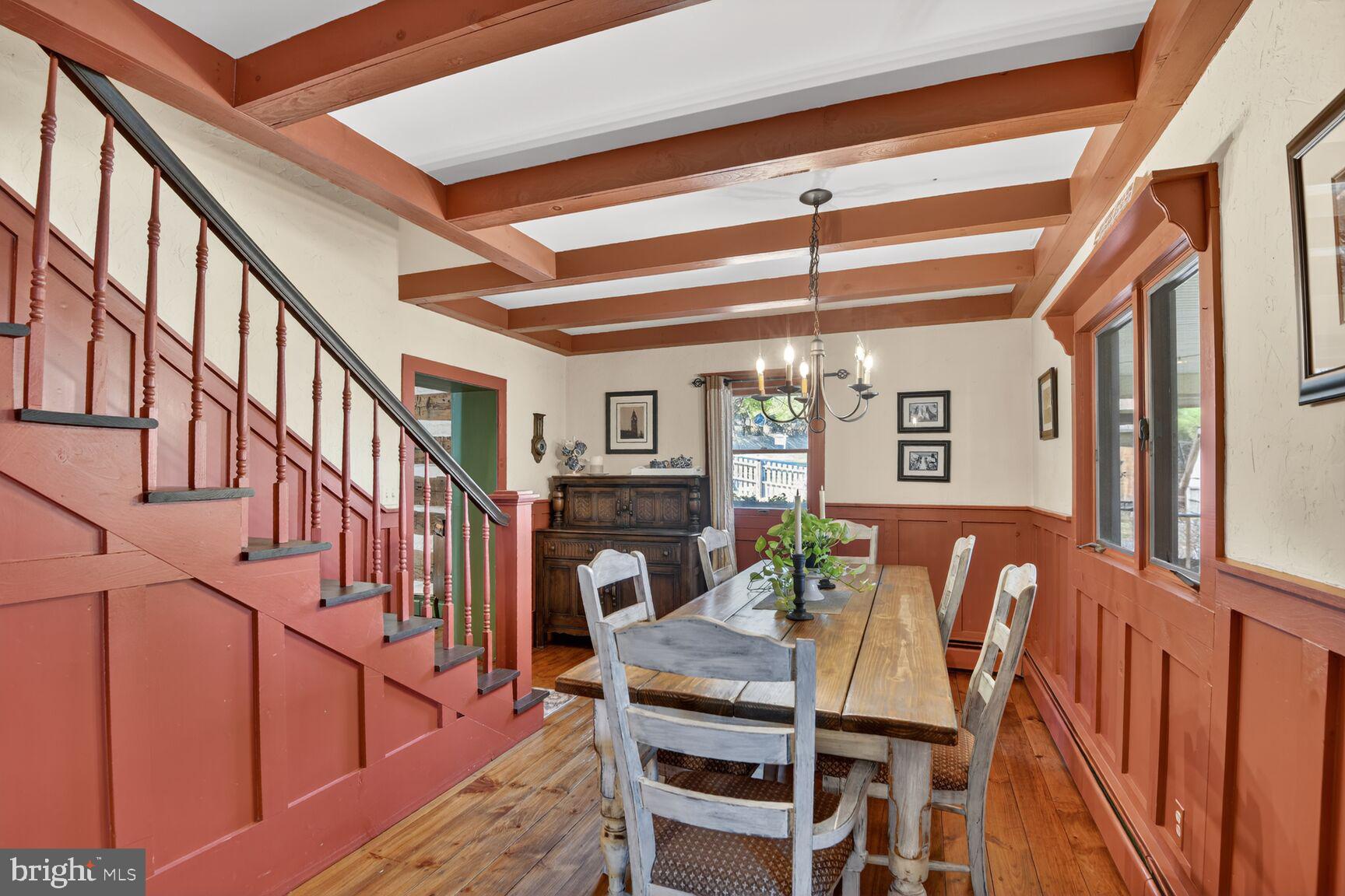 2338 Jim Kohler Road Eldersburg, MD 21784 - Photo 24 of 63 a view of a dining room with furniture window and wooden floor