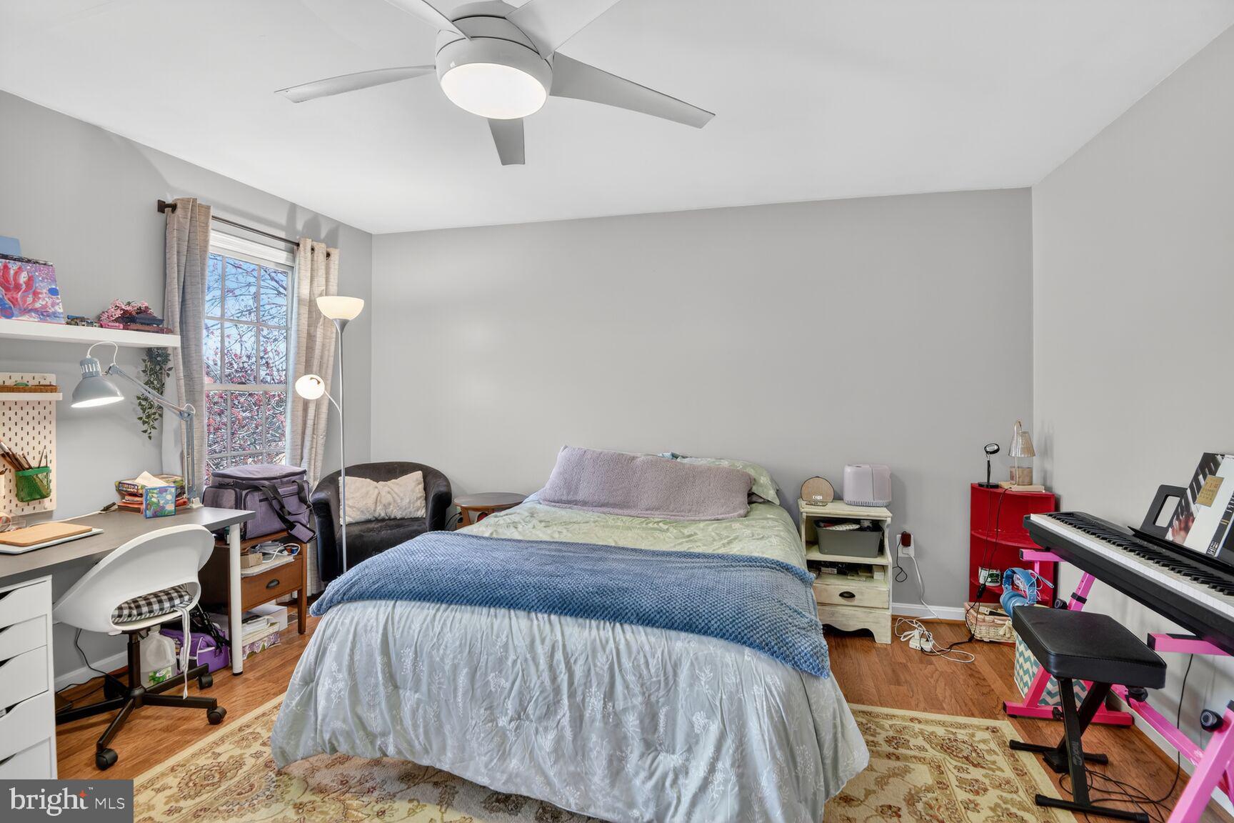 2338 Jim Kohler Road Eldersburg, MD 21784 - Photo 36 of 63 a bed room with a bed and a desk