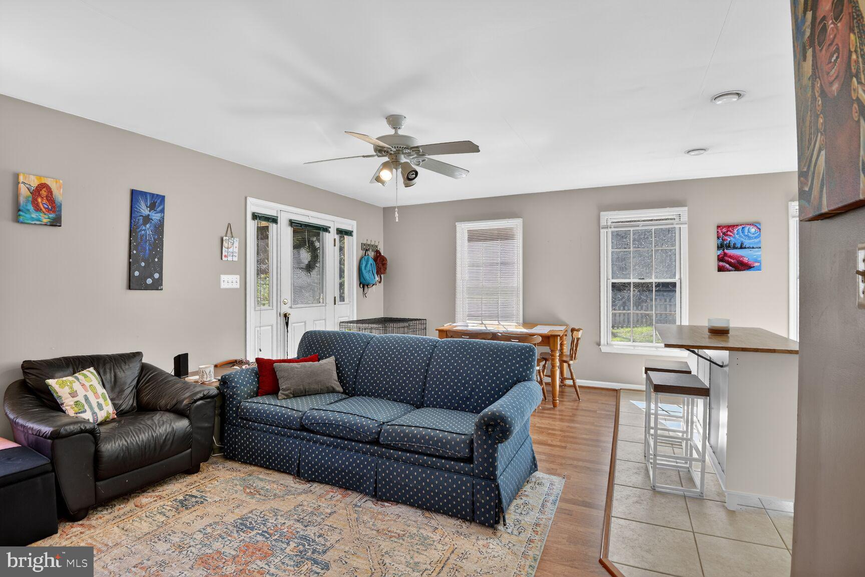 2338 Jim Kohler Road Eldersburg, MD 21784 - Photo 40 of 63 a living room with furniture and a window