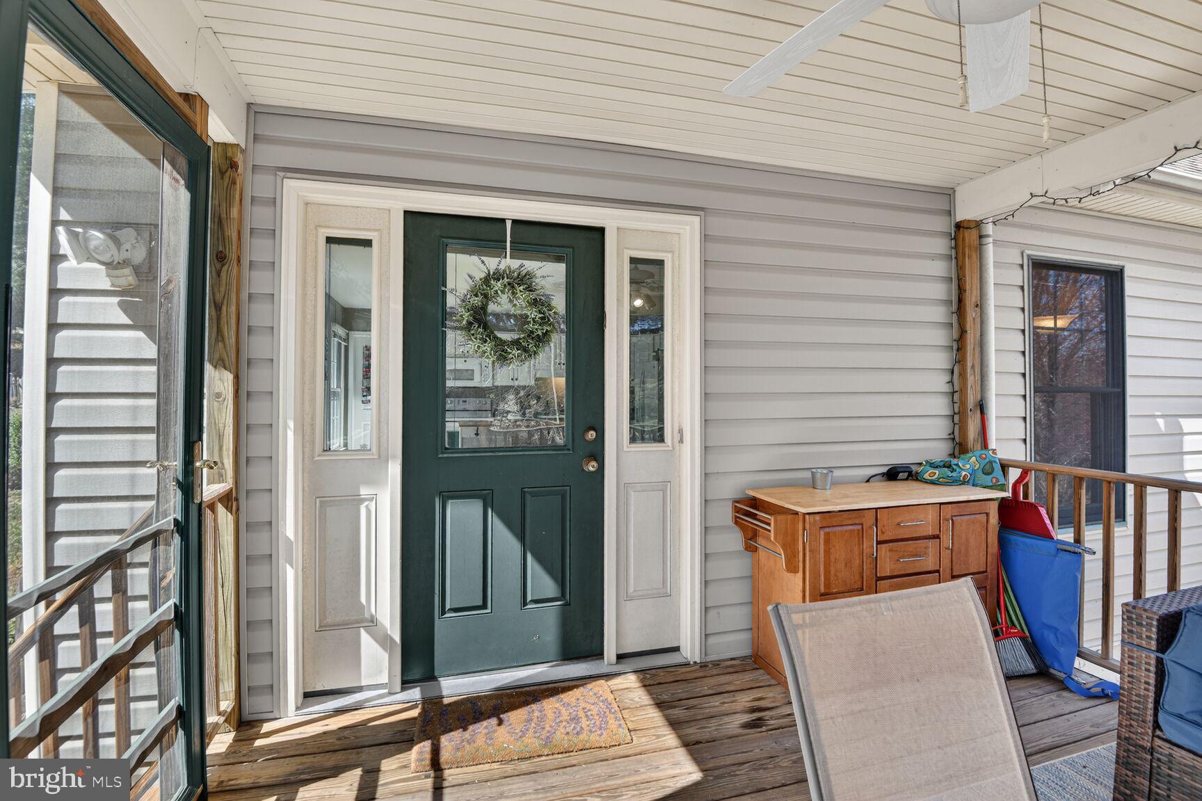 2338 Jim Kohler Road Eldersburg, MD 21784 - Photo 42 of 63 a view of a balcony with furniture