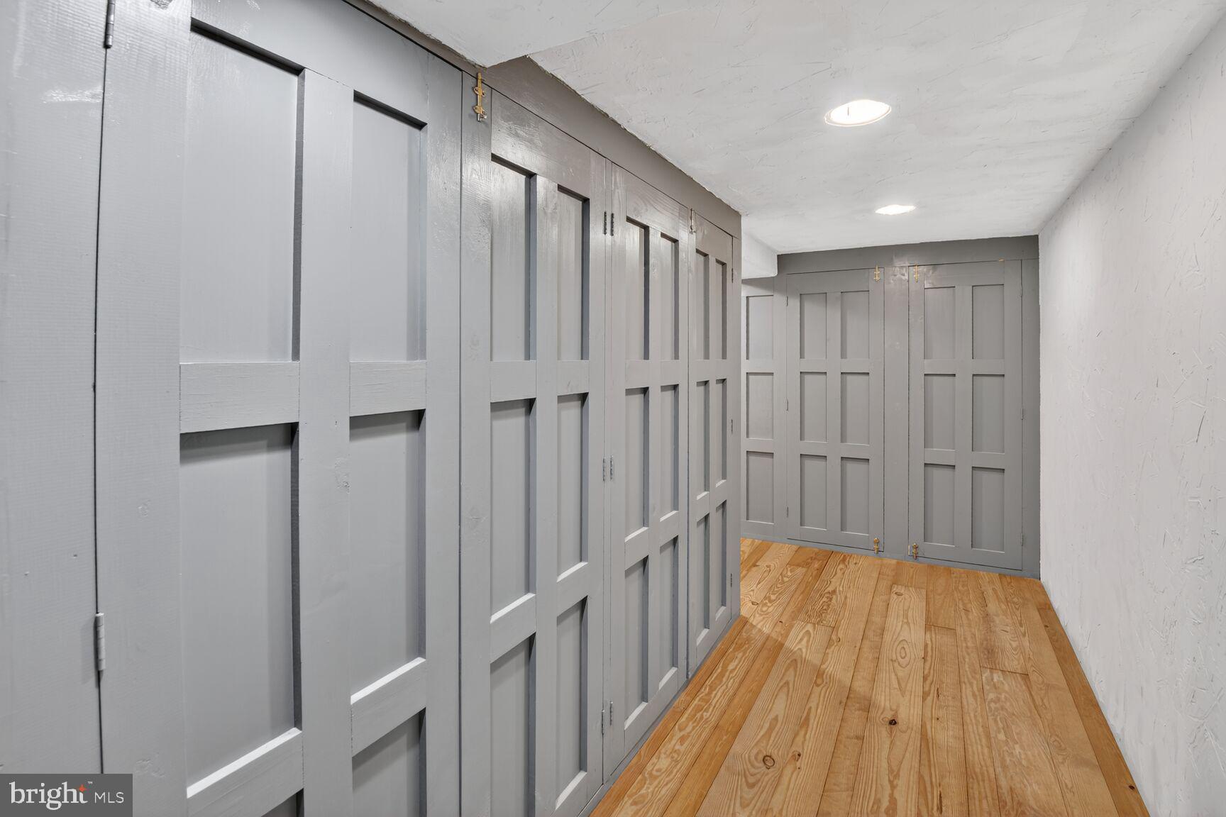 2338 Jim Kohler Road Eldersburg, MD 21784 - Photo 55 of 63 a view of a hallway with wooden floor