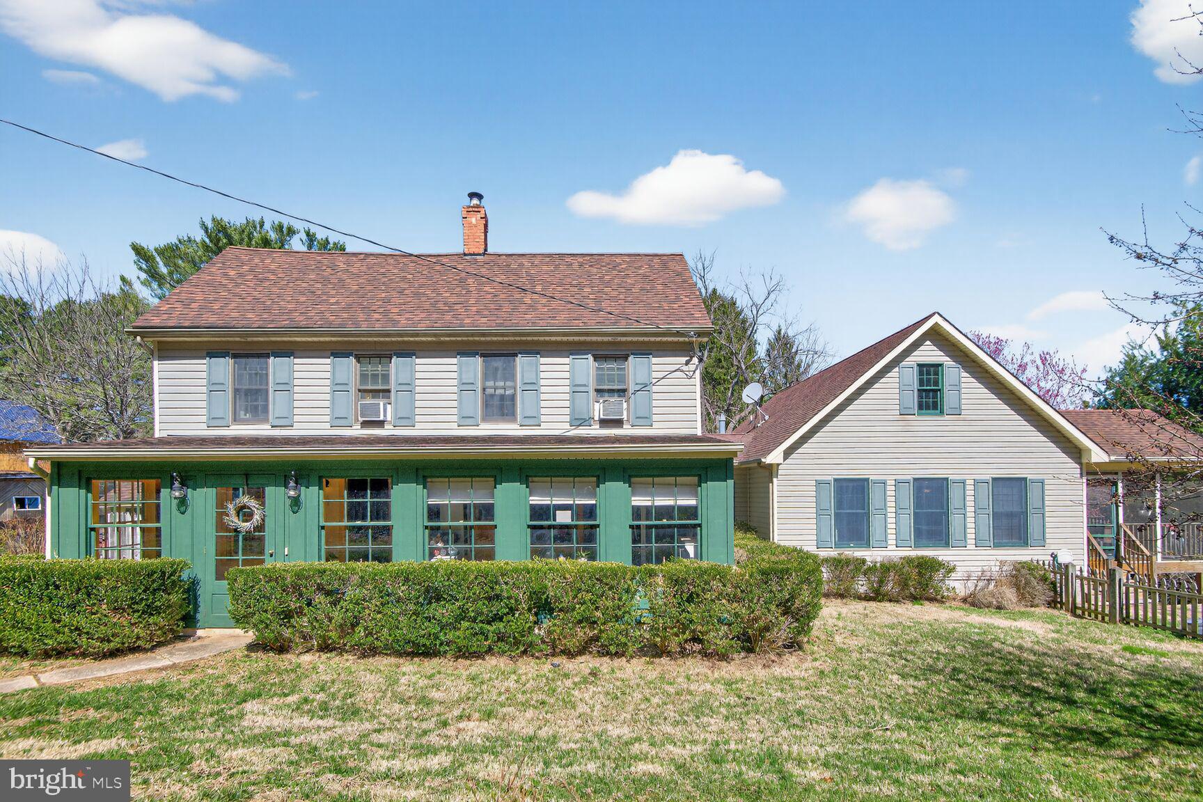 2338 Jim Kohler Road Eldersburg, MD 21784 - Photo 63 of 63 a front view of a house with a yard