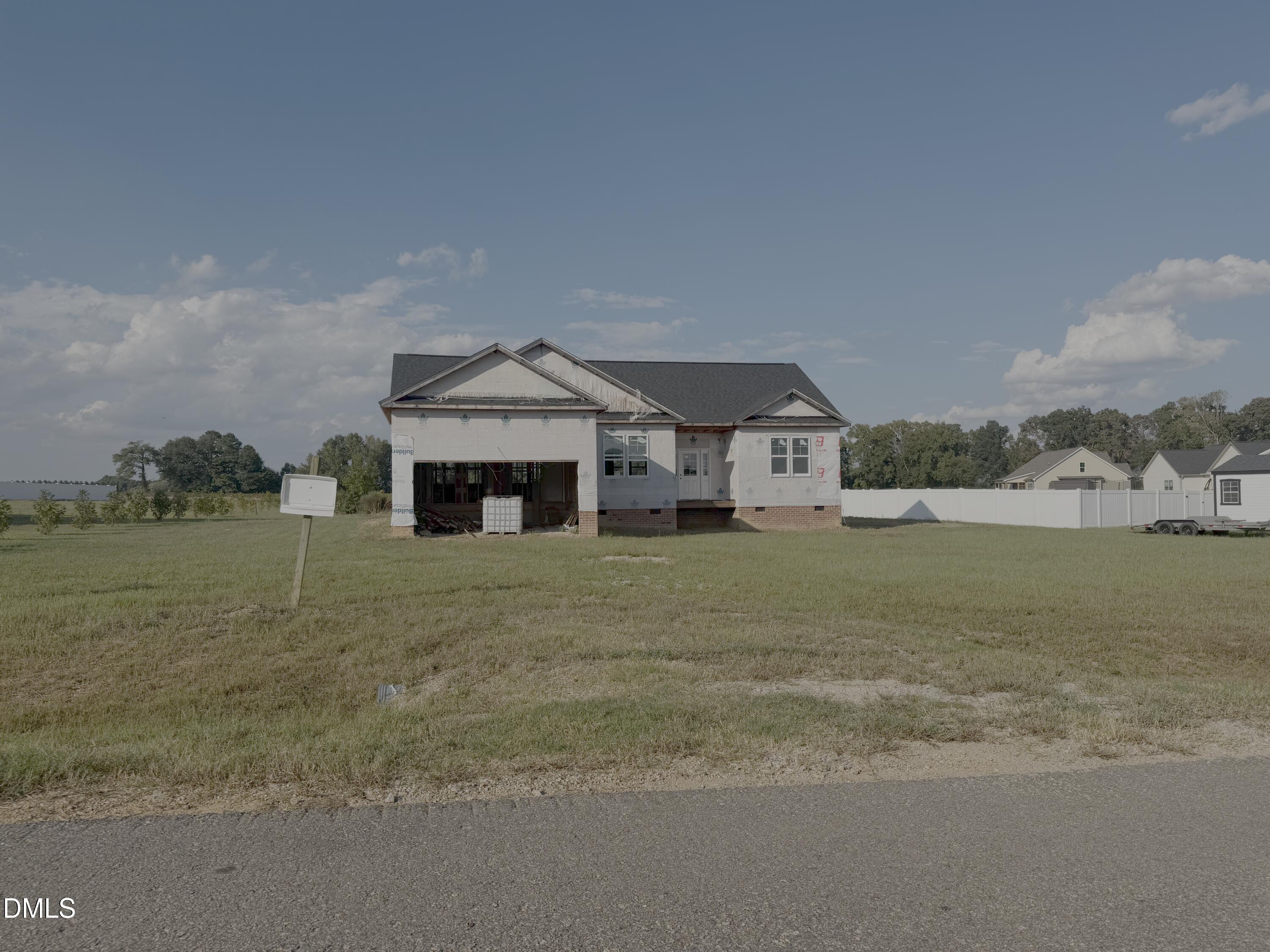 a front view of a house with a ocean view