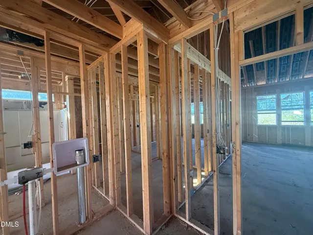 a view of an entryway with a white door