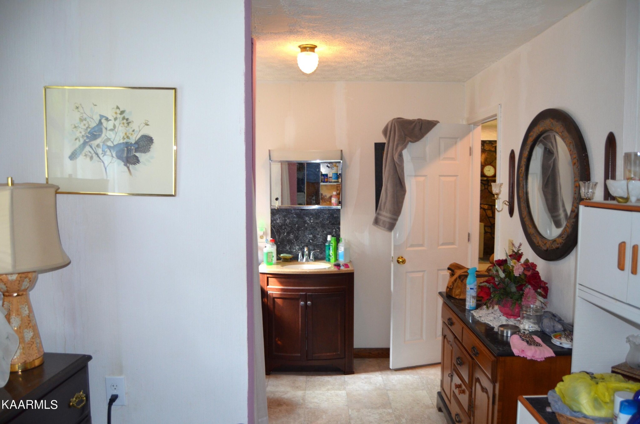 484 Kerrigan Road Crossville, TN 38555 - Photo 12 of 23 a view of storage and utility room with two washing machine