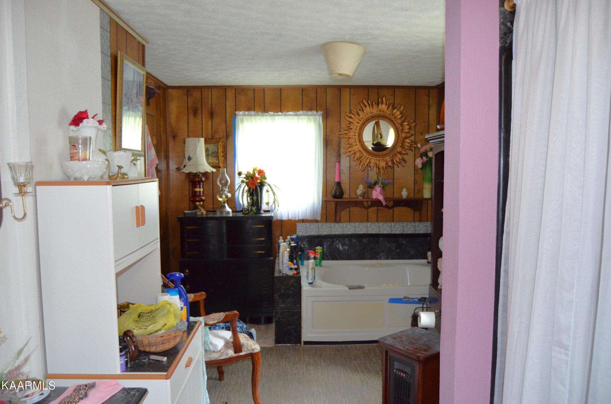484 Kerrigan Road Crossville, TN 38555 - Photo 13 of 23 a bathroom with a sink mirror and vanity