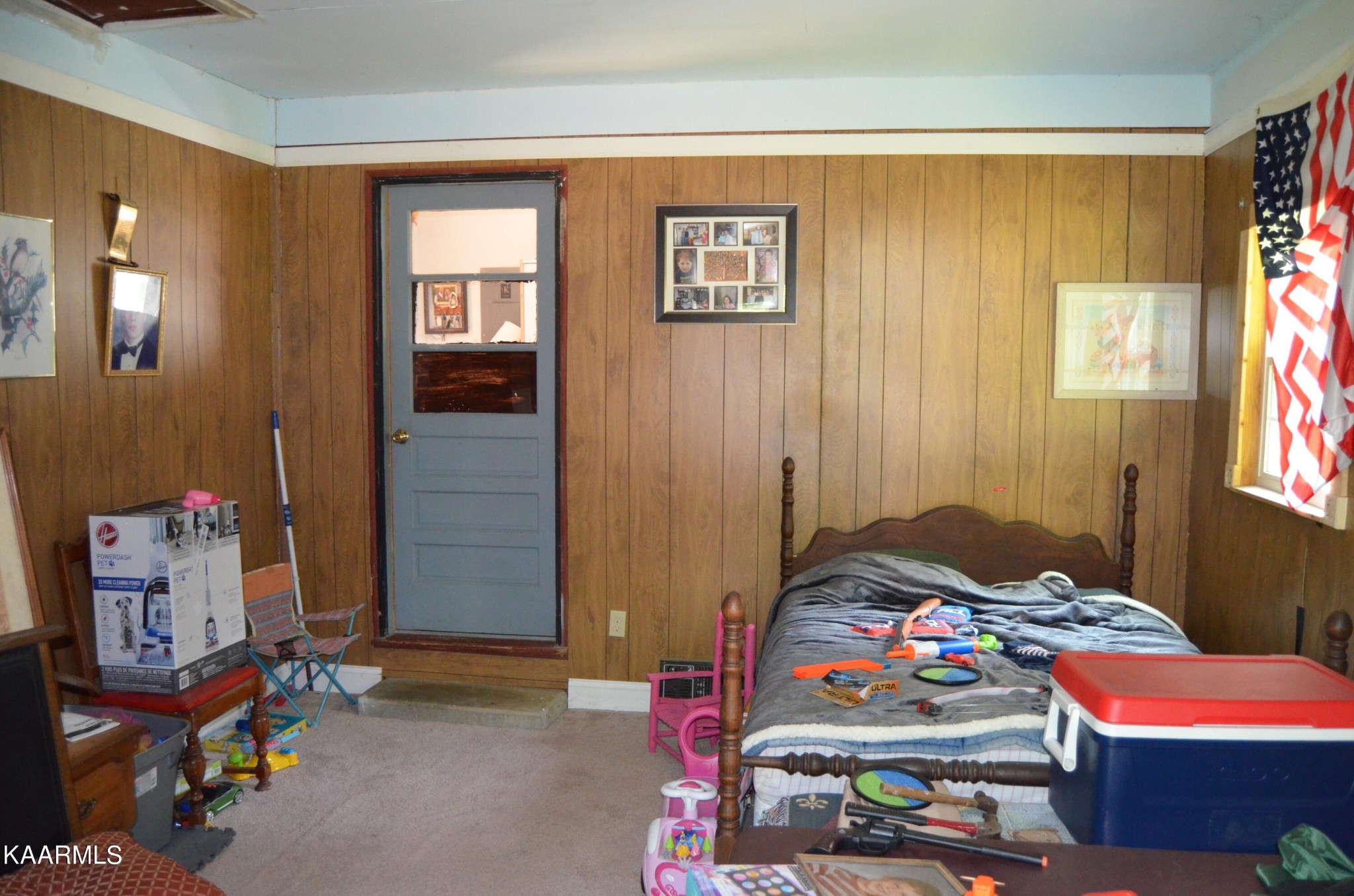 484 Kerrigan Road Crossville, TN 38555 - Photo 17 of 23 a bedroom with a bed and a window