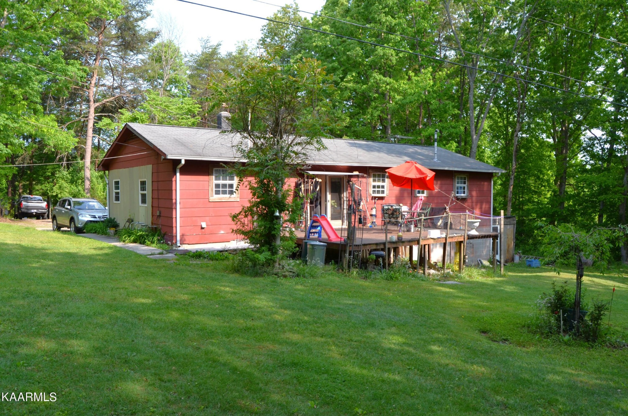 484 Kerrigan Road Crossville, TN 38555 - Photo 18 of 23 a front view of house with yard and green space