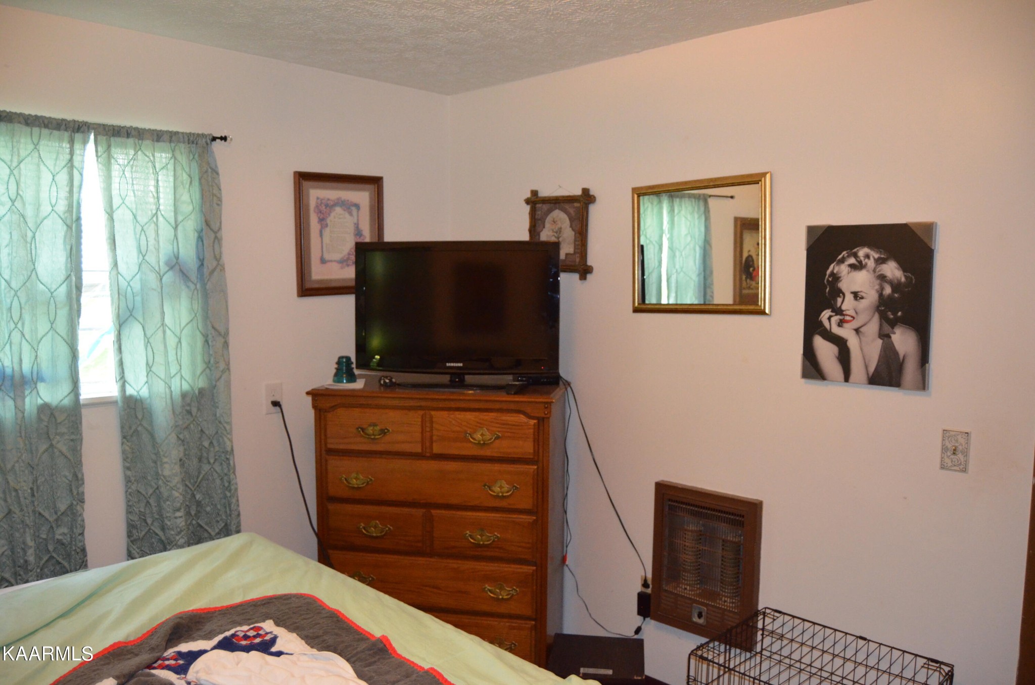 484 Kerrigan Road Crossville, TN 38555 - Photo 9 of 23 a bedroom with a bed and television
