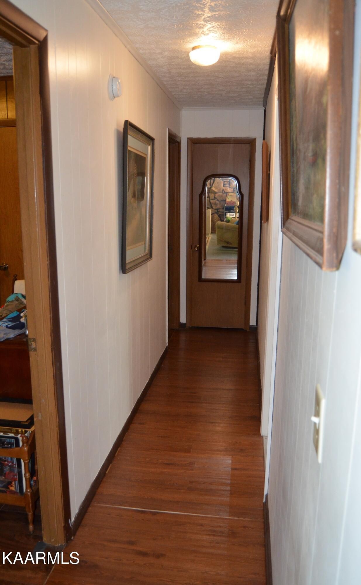 484 Kerrigan Road Crossville, TN 38555 - Photo 10 of 23 a view of hallway with wooden floor