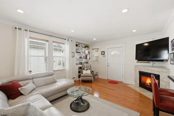 a kitchen with granite countertop a sink stainless steel appliances and counter space