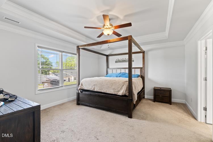 117 Boomer Street Benson, NC 27504 - Photo 17 of 31 a bedroom with a bed and window