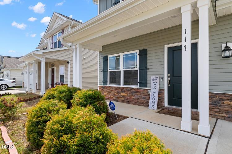 117 Boomer Street Benson, NC 27504 - Photo 3 of 31 a house view with a outdoor space