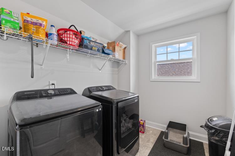117 Boomer Street Benson, NC 27504 - Photo 31 of 31 a utility room with dryer and washer