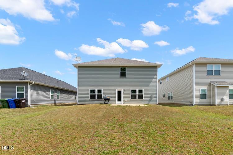 117 Boomer Street Benson, NC 27504 - Photo 4 of 31 a front view of house with yard