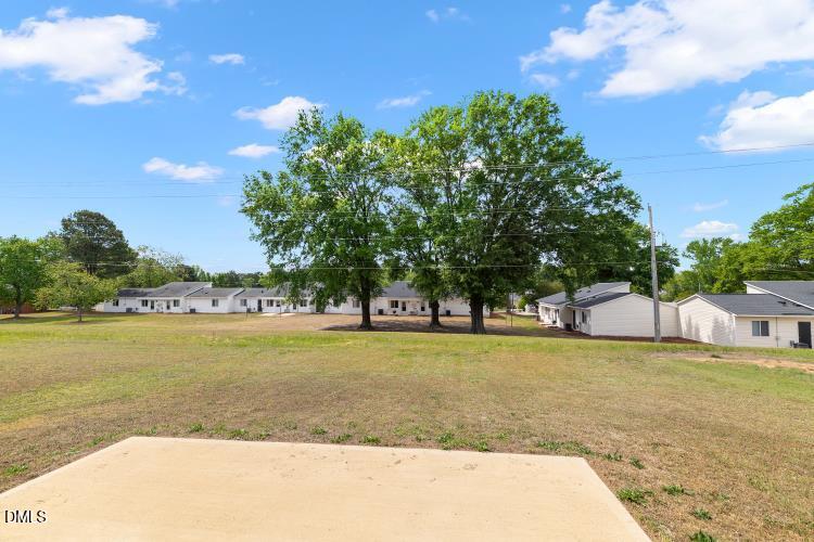 117 Boomer Street Benson, NC 27504 - Photo 5 of 31 a view of a swimming pool and an outdoor space