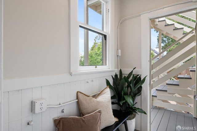 a view of a patio with furniture