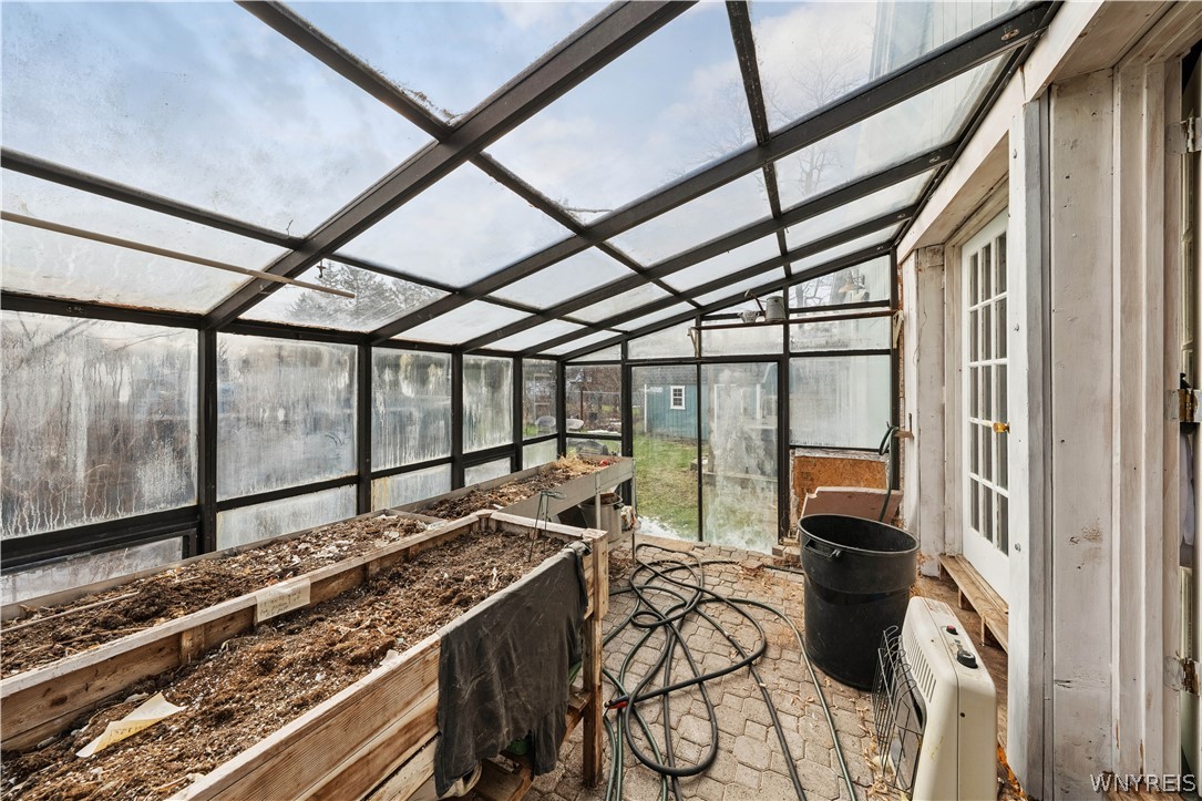 664 Back Street Pembroke, NY 14036 - Photo 8 of 44 Greenhouse - kitchen walkout