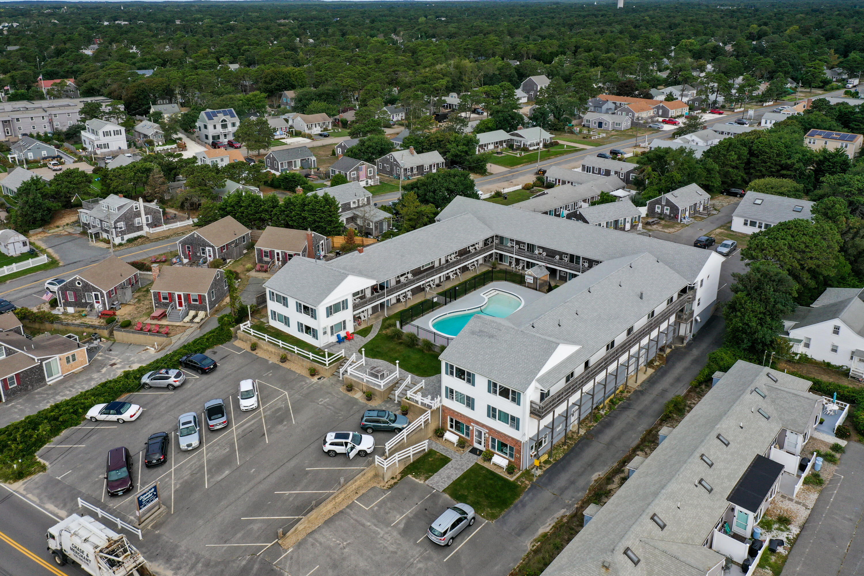 154 Old Wharf Road, Unit 19 Dennis Port, MA 02639 - Photo 13 of 15 an aerial view of a house with a lake