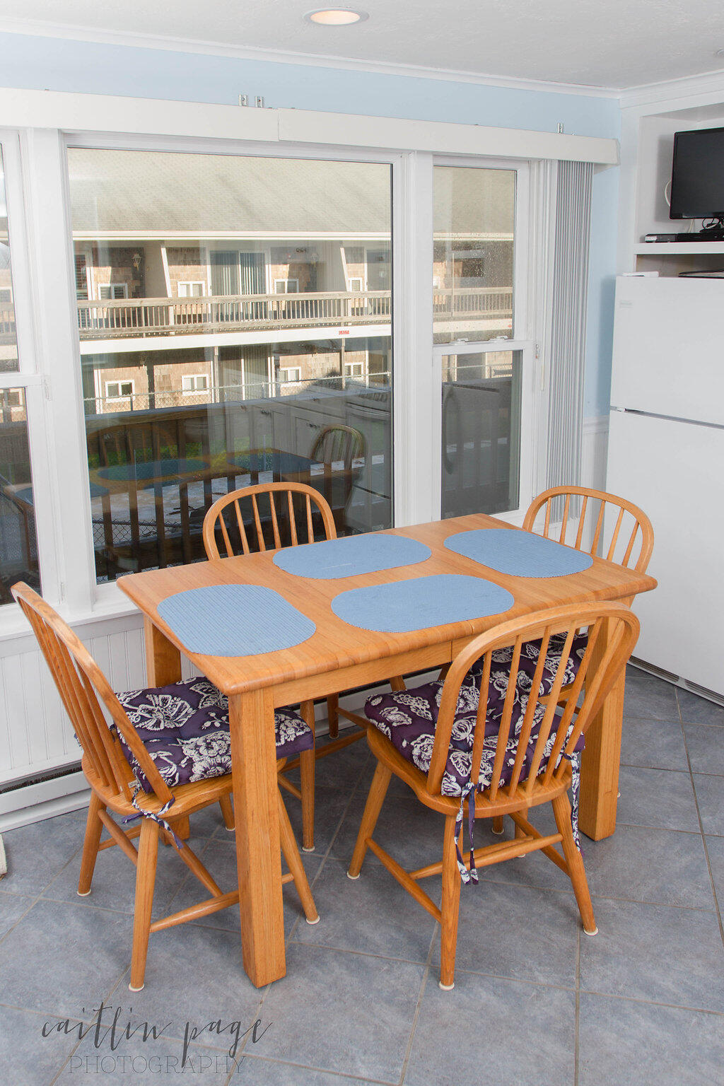 154 Old Wharf Road, Unit 19 Dennis Port, MA 02639 - Photo 4 of 15 a dining room with a table and chairs