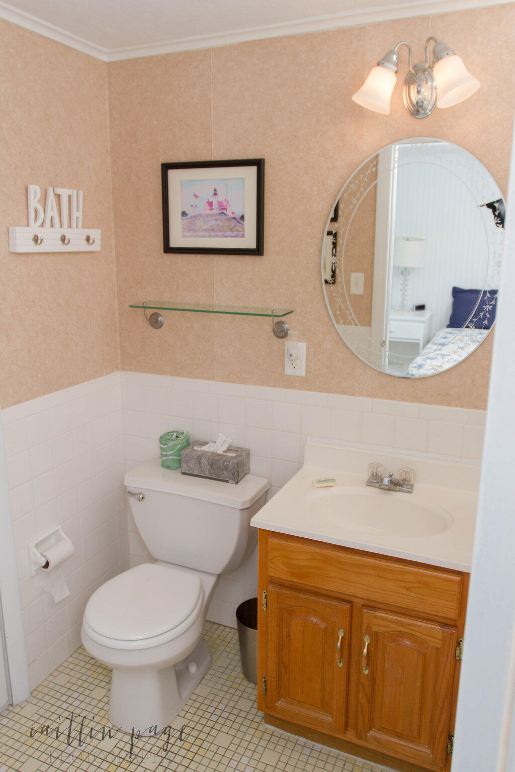 154 Old Wharf Road, Unit 19 Dennis Port, MA 02639 - Photo 6 of 15 a bathroom with a toilet a sink and mirror