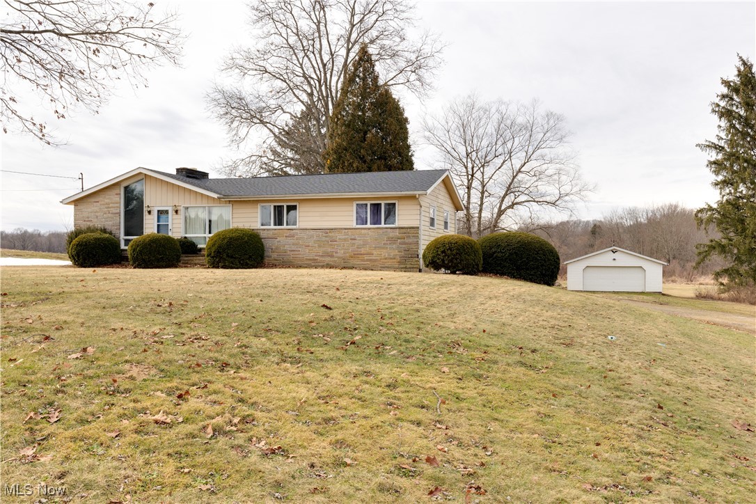 1847 Conley Road Mogadore, OH 44260 - Photo 1 of 42 Welcome to 1847 Conly Rd . This home is located in Suffield Oh on 7 acres with 2 car attached plus a detached garage too. This is a diamond in the rough- waiting for your vision.