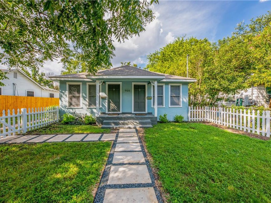 906 Capitol Court, Unit B Austin, TX 78751 - Photo 1 of 12 a front view of a house with a garden and yard
