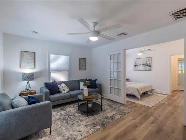 a living room with furniture and a couch