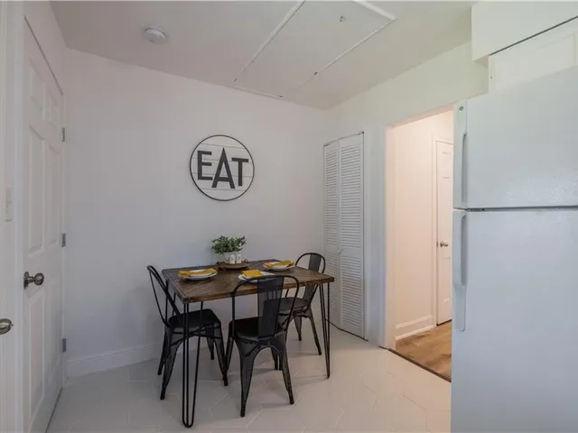 a view of a dining room with furniture