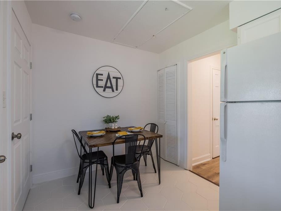 906 Capitol Court, Unit B Austin, TX 78751 - Photo 10 of 12 a view of a dining room with furniture