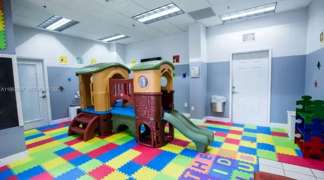 a bedroom with a bed and a small space