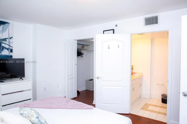 a bathroom with a sink and a shower