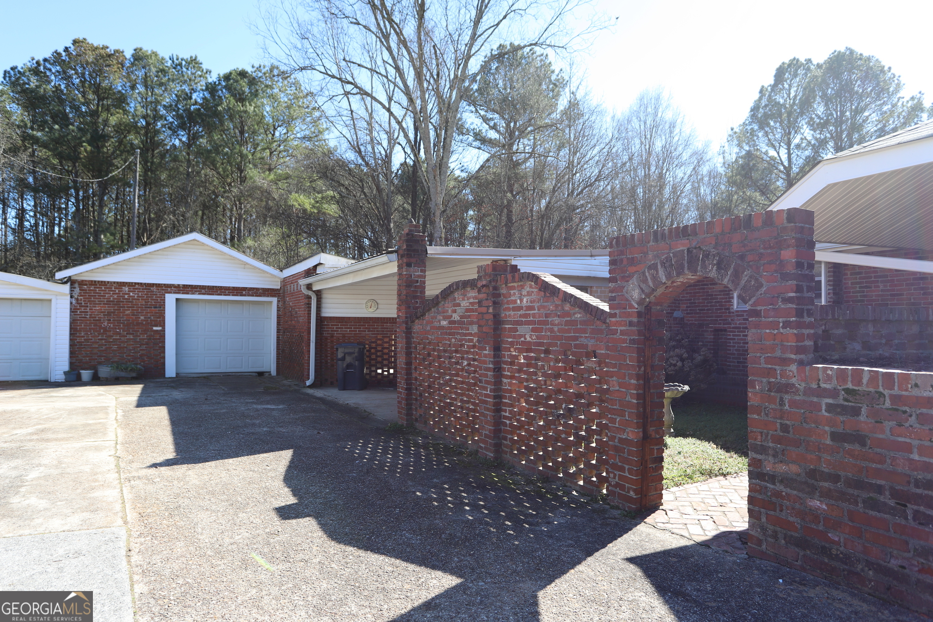6797 Highway 114 Lyerly, GA 30730 - Photo 16 of 56 a front view of a house with a yard