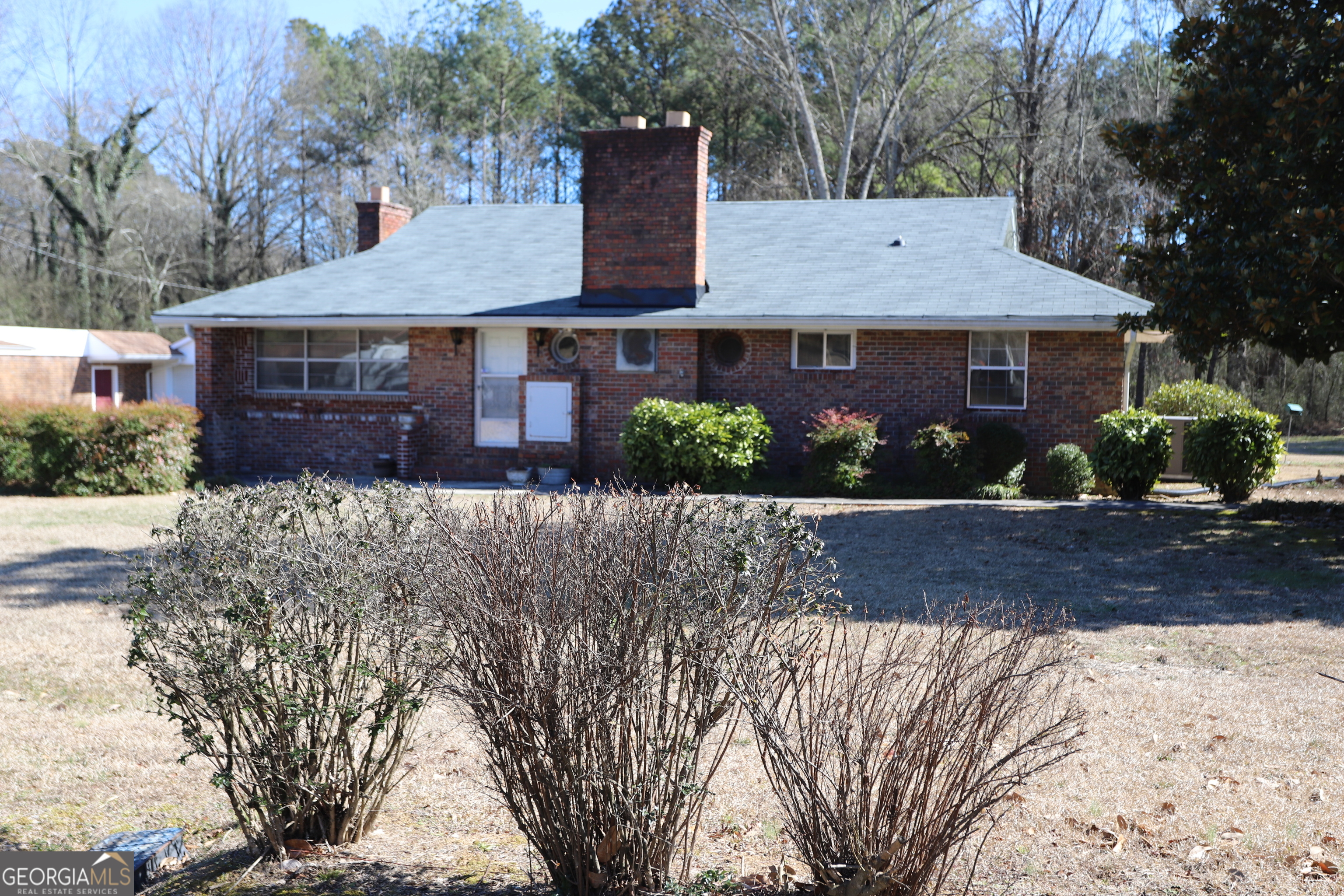 6797 Highway 114 Lyerly, GA 30730 - Photo 2 of 56 front view of a house with a yard